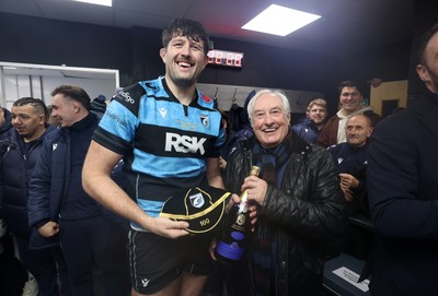 131225 - Cardiff Rugby v Ulster - United Rugby Championship - Rory Thornton of Cardiff receives his 100th cap from Sir Gareth Edwards