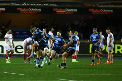 131225 - Cardiff Rugby v Ulster - EPCR Challenge Cup - Callum Sheedy of Cardiff celebrates with team mates as he wins the match with the final kick of the game