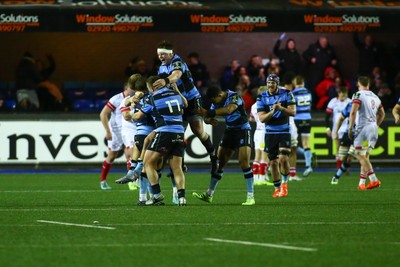 131225 - Cardiff Rugby v Ulster - EPCR Challenge Cup - Callum Sheedy of Cardiff celebrates with team mates as he wins the match with the final kick of the game