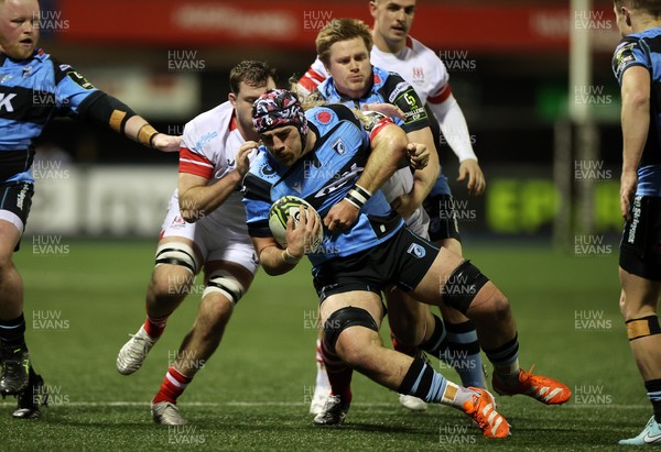 131225 - Cardiff Rugby v Ulster - United Rugby Championship - Alun Lawrence of Cardiff is tackled by Werner Kok of Ulster 