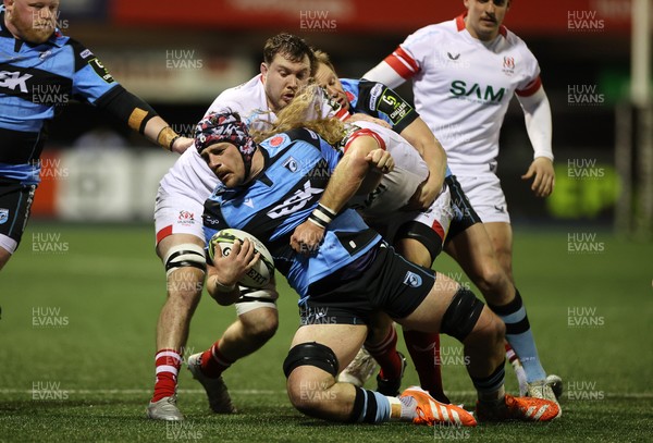131225 - Cardiff Rugby v Ulster - United Rugby Championship - Alun Lawrence of Cardiff is tackled by Werner Kok of Ulster 