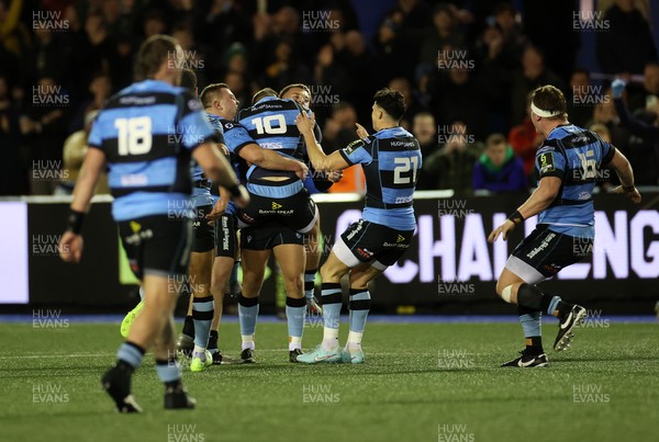 131225 - Cardiff Rugby v Ulster - United Rugby Championship - Callum Sheedy of Cardiff celebrates with teams mates after winning the game