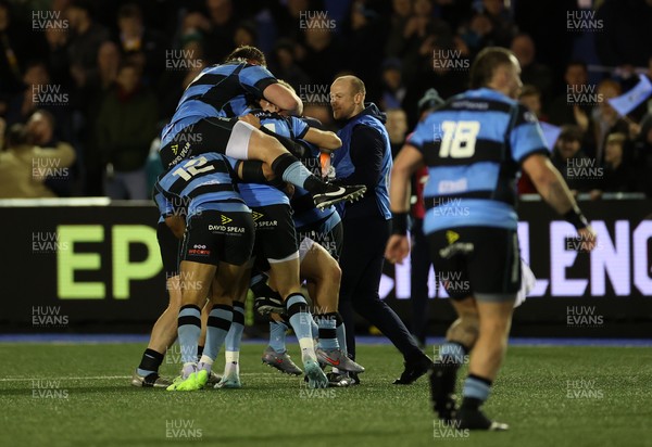 131225 - Cardiff Rugby v Ulster - United Rugby Championship - Callum Sheedy of Cardiff celebrates with teams mates after winning the game