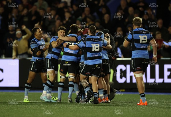 131225 - Cardiff Rugby v Ulster - United Rugby Championship - Callum Sheedy of Cardiff celebrates with teams mates after winning the game