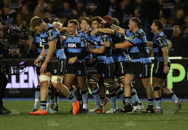 131225 - Cardiff Rugby v Ulster - United Rugby Championship - Callum Sheedy of Cardiff celebrates with teams mates after winning the game
