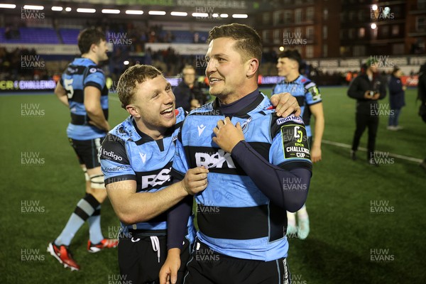 131225 - Cardiff Rugby v Ulster - United Rugby Championship - Tom Bowen and Callum Sheedy of Cardiff celebrate at full time