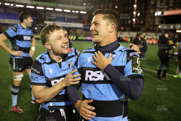 131225 - Cardiff Rugby v Ulster - United Rugby Championship - Tom Bowen and Callum Sheedy of Cardiff celebrate at full time