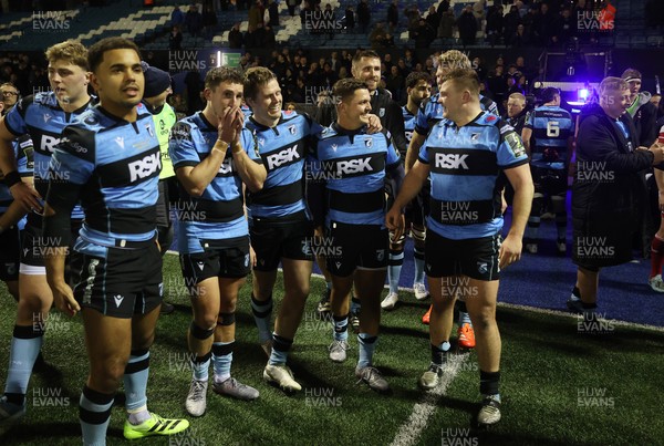 131225 - Cardiff Rugby v Ulster - United Rugby Championship - Callum Sheedy of Cardiff celebrates at full time with team mates