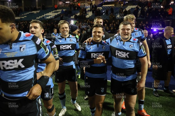 131225 - Cardiff Rugby v Ulster - United Rugby Championship - Callum Sheedy of Cardiff celebrates at full time with team mates