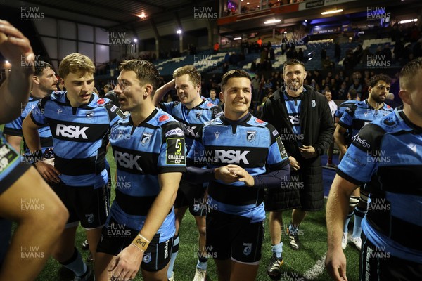 131225 - Cardiff Rugby v Ulster - United Rugby Championship - Callum Sheedy of Cardiff celebrates at full time with team mates