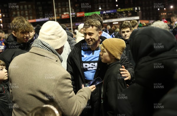 131225 - Cardiff Rugby v Ulster - United Rugby Championship - Leigh Halfpenny of Cardiff with fans at full time