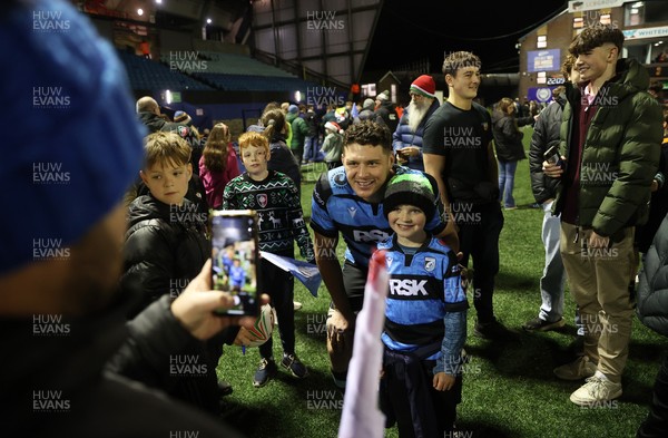 131225 - Cardiff Rugby v Ulster - United Rugby Championship - James Botham of Cardiff with fans at full time