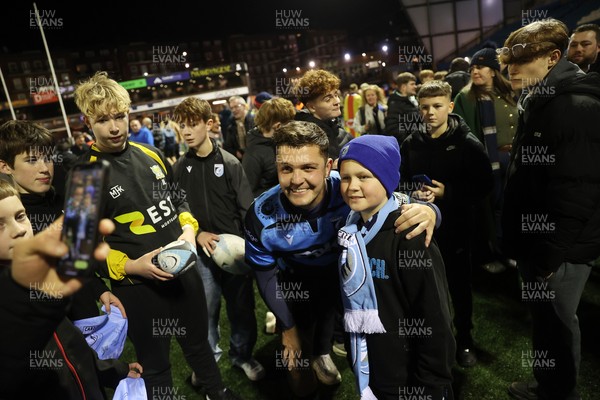 131225 - Cardiff Rugby v Ulster - United Rugby Championship - Callum Sheedy of Cardiff with fans at full time