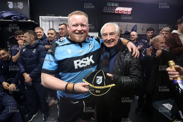 131225 - Cardiff Rugby v Ulster - United Rugby Championship - Keiron Assiratti of Cardiff receives his 100th cap from Sir Gareth Edwards