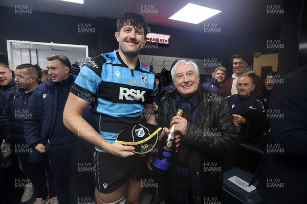 131225 - Cardiff Rugby v Ulster - United Rugby Championship - Rory Thornton of Cardiff receives his 100th cap from Sir Gareth Edwards