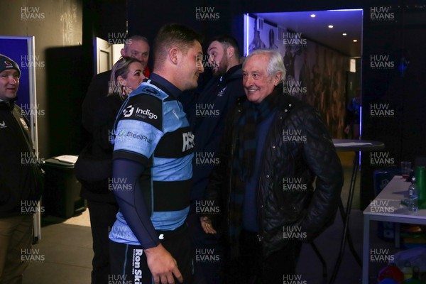 131225 - Cardiff Rugby v Ulster - EPCR Challenge Cup - Callum Sheedy of Cardiff is greeted by Sir Gareth Edwards as he leaves the field 