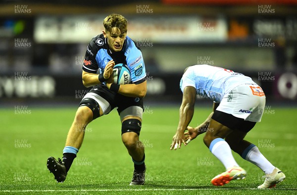101123 - Cardiff Rugby v Vodacom Bulls - United Rugby Championship - Alex Mann of Cardiff is tackled by Sergeal Petersen of Bulls
