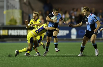 021026 - Cardiff Rugby v Zebre Parma - United Rugby Championship - Harri Millard of Cardiff is tackled by Simone Gesi of Zebre 