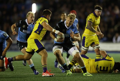 021026 - Cardiff Rugby v Zebre Parma - United Rugby Championship - Josh McNally of Cardiff is tackled by Federico Pisani of Zebre 