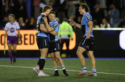 021026 - Cardiff Rugby v Zebre Parma - United Rugby Championship - Jacob Beetham, Tom Bowen and Le Roux Malan of Cardiff at full time