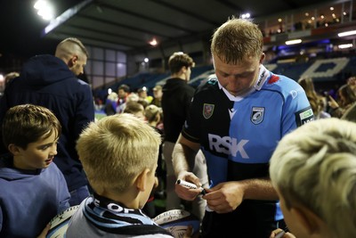 021026 - Cardiff Rugby v Zebre Parma - United Rugby Championship - Rhys Barratt of Cardiff with fans at full time