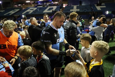 021026 - Cardiff Rugby v Zebre Parma - United Rugby Championship - Sam Wainwright of Cardiff with fans at full time