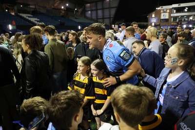 021026 - Cardiff Rugby v Zebre Parma - United Rugby Championship - Alex Mann of Cardiff with fans at full time