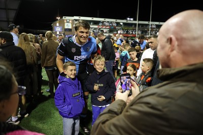 021026 - Cardiff Rugby v Zebre Parma - United Rugby Championship - Teddy Williams of Cardiff with fans at full time