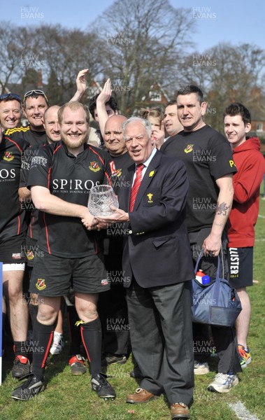 200413 - Cardiff Saracens v St Julians - SWALEC League Divison 6 South East -Cardiff Saracens captain Bryn Morgan receives the trophy from WRU board member Roy Giddings  