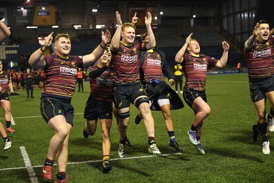 031225 - Cardiff Uni v Cardiff Met - Cardiff Clash - Cardiff Met players celebrate the win at full time