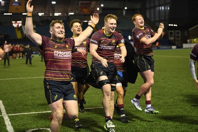 031225 - Cardiff Uni v Cardiff Met - Cardiff Clash - Cardiff Met players celebrate the win at full time