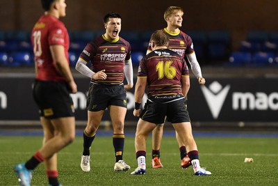 031225 - Cardiff Uni v Cardiff Met - Cardiff Clash - Cardiff Met players celebrate the win at full time