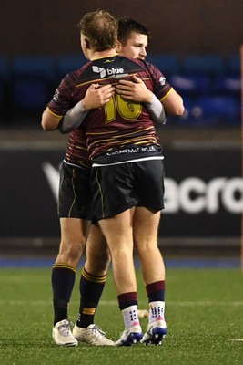 031225 - Cardiff Uni v Cardiff Met - Cardiff Clash - Cardiff Met players celebrate the win at full time
