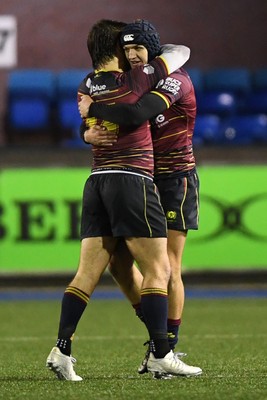 031225 - Cardiff Uni v Cardiff Met - Cardiff Clash - Cardiff Met players celebrate the win at full time