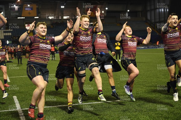031225 - Cardiff Uni v Cardiff Met - Cardiff Clash - Cardiff Met players celebrate the win at full time