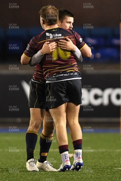 031225 - Cardiff Uni v Cardiff Met - Cardiff Clash - Cardiff Met players celebrate the win at full time