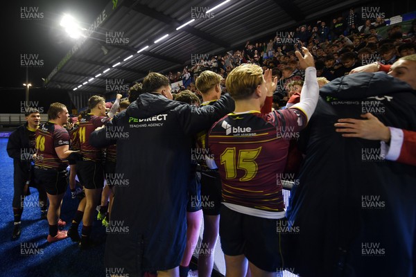 031225 - Cardiff Uni v Cardiff Met - Cardiff Clash - Cardiff Met players celebrate the win at full time
