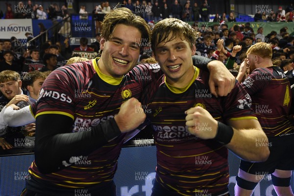 031225 - Cardiff Uni v Cardiff Met - Cardiff Clash - Cardiff Met players celebrate the win at full time