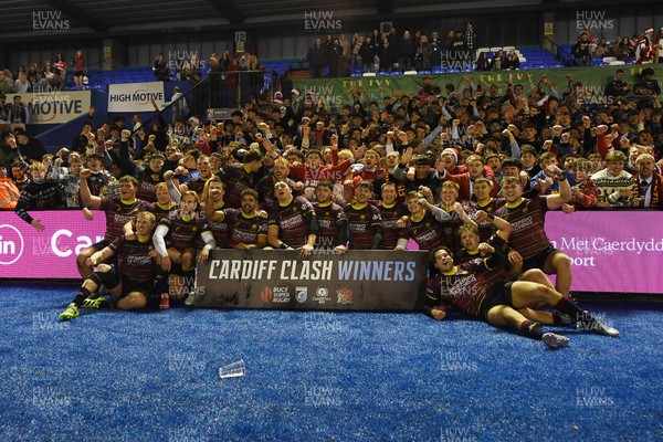 031225 - Cardiff Uni v Cardiff Met - Cardiff Clash - Cardiff Met players celebrate the win at full time