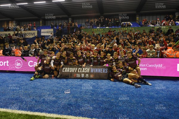 031225 - Cardiff Uni v Cardiff Met - Cardiff Clash - Cardiff Met players celebrate the win at full time