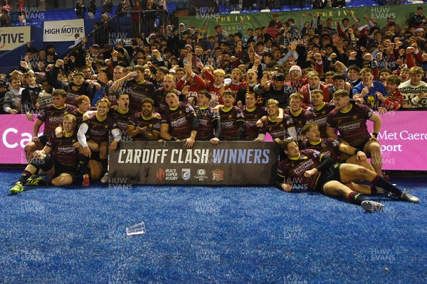 031225 - Cardiff Uni v Cardiff Met - Cardiff Clash - Cardiff Met players celebrate the win at full time