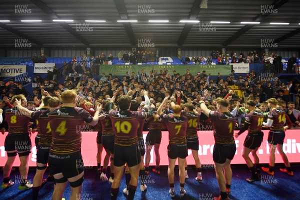 031225 - Cardiff Uni v Cardiff Met - Cardiff Clash - Cardiff Met players celebrate the win at full time with fans