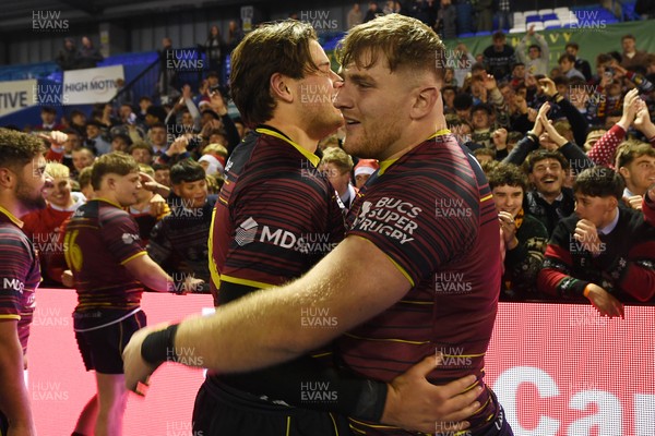 031225 - Cardiff Uni v Cardiff Met - Cardiff Clash - Cardiff Met players celebrate the win at full time