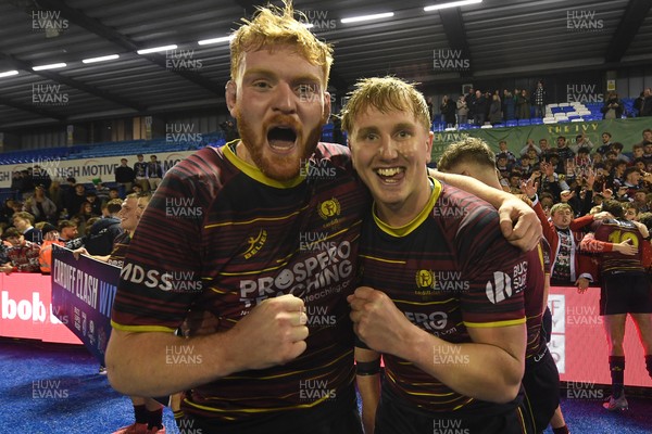 031225 - Cardiff Uni v Cardiff Met - Cardiff Clash - Cardiff Met players celebrate the win at full time