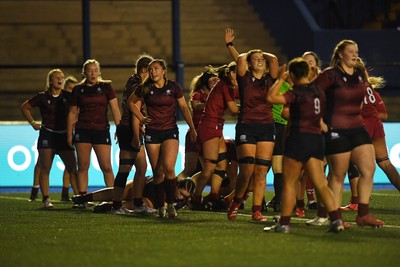 031225 - Cardiff Uni Women v Cardiff Met Women - Cardiff Clash - Dejected Cardiff Met after Lillian Brady of Cardiff Uni scores a try