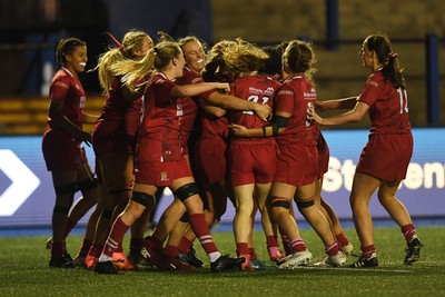 031225 - Cardiff Uni Women v Cardiff Met Women - Cardiff Clash - Lillian Brady of Cardiff Uni celebrates scoring a try with team mates