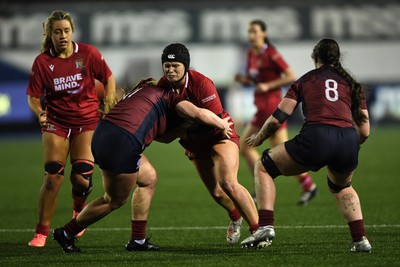 031225 - Cardiff Uni Women v Cardiff Met Women - Cardiff Clash - Evie Guy of Cardiff Uni is challenged by Libby Naughton of Cardiff Met