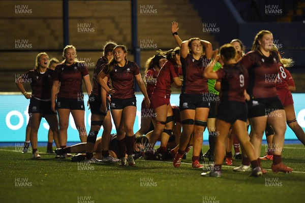 031225 - Cardiff Uni Women v Cardiff Met Women - Cardiff Clash - Dejected Cardiff Met after Lillian Brady of Cardiff Uni scores a try