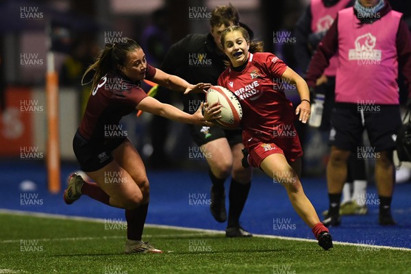 031225 - Cardiff Uni Women v Cardiff Met Women - Cardiff Clash - Mouse Robinson of Cardiff Uni is challenged by Elizabeth Cook of Cardiff Met
