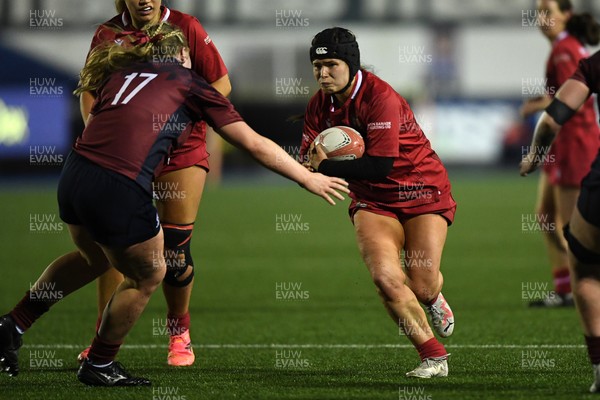 031225 - Cardiff Uni Women v Cardiff Met Women - Cardiff Clash - Evie Guy of Cardiff Uni is challenged by Libby Naughton of Cardiff Met